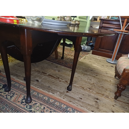102 - Late 19th Century Oval Drop Leaf Table on Pad Foot Base