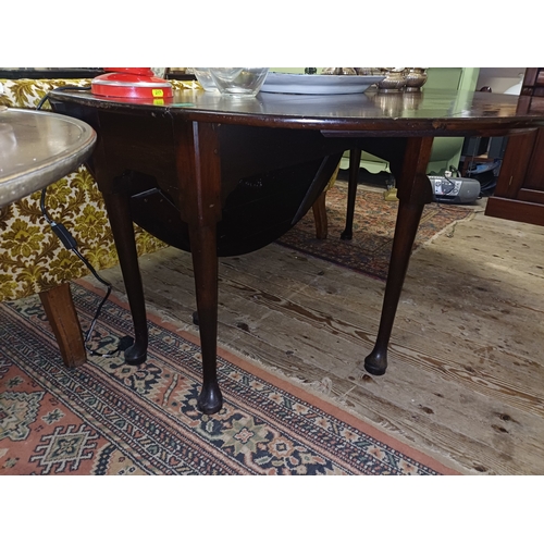 102 - Late 19th Century Oval Drop Leaf Table on Pad Foot Base