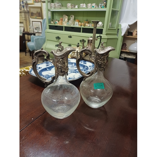 104 - Pair of Silver Plate and Glass Claret Jugs