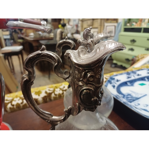 104 - Pair of Silver Plate and Glass Claret Jugs