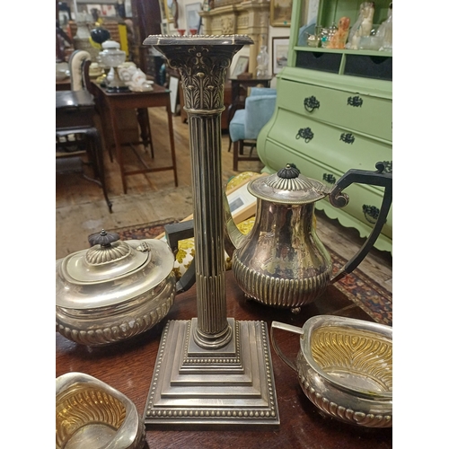 106 - Tall Silver Plate Candlestick of Corinthian Form together with a 4 Piece Silver Plate Tea Set