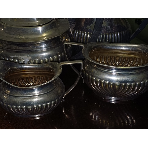 106 - Tall Silver Plate Candlestick of Corinthian Form together with a 4 Piece Silver Plate Tea Set