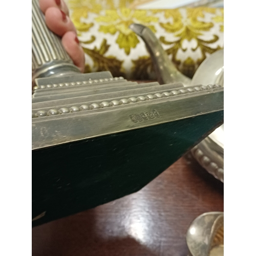 106 - Tall Silver Plate Candlestick of Corinthian Form together with a 4 Piece Silver Plate Tea Set