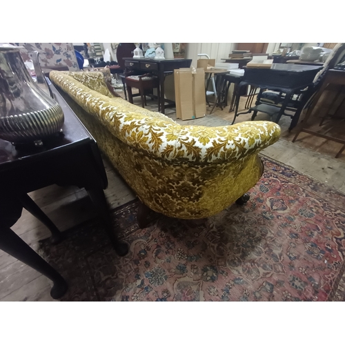 107 - Good Victorian Carved Walnut Show Frame Sofa of Serpentine Form