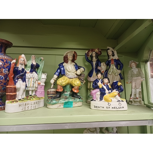 63 - Collection of Staffordshire Figural Groups