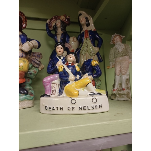 63 - Collection of Staffordshire Figural Groups