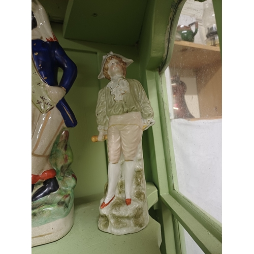 63 - Collection of Staffordshire Figural Groups