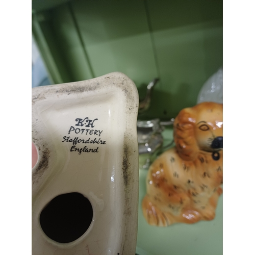 67 - Lot of 4 Staffordshire Pottery Dogs