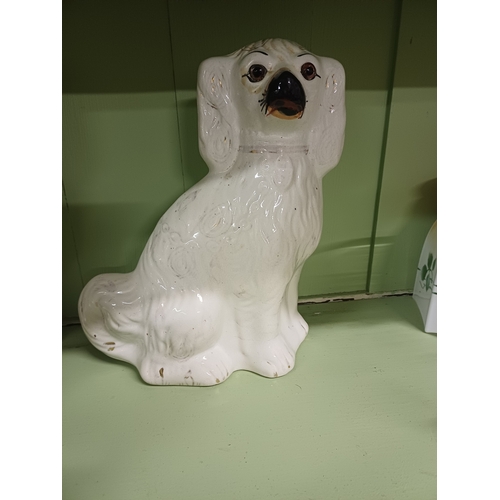 67 - Lot of 4 Staffordshire Pottery Dogs