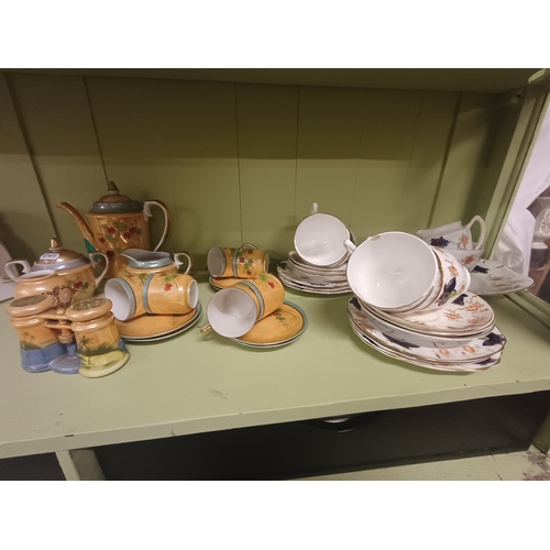 69 - Oriental 17 Piece Pottery Coffee Set and a 21 Piece Bone China Tea Set
