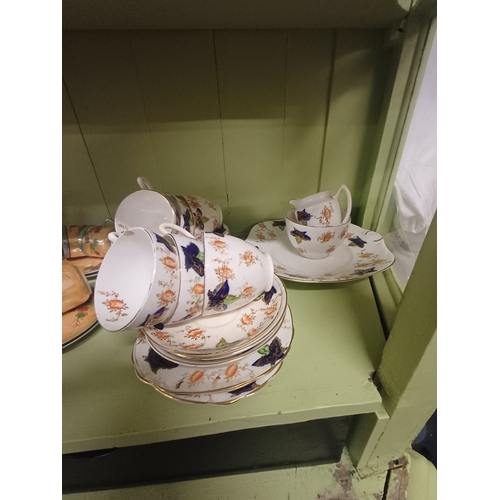 69 - Oriental 17 Piece Pottery Coffee Set and a 21 Piece Bone China Tea Set