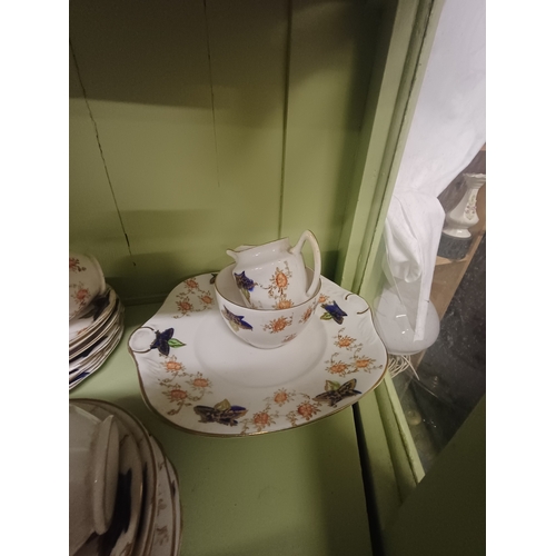 69 - Oriental 17 Piece Pottery Coffee Set and a 21 Piece Bone China Tea Set