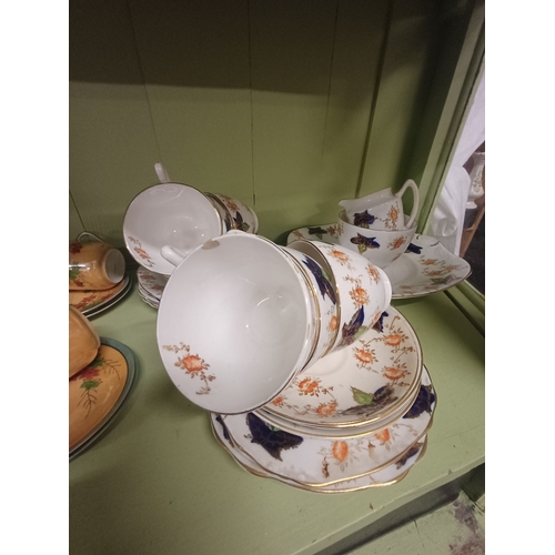 69 - Oriental 17 Piece Pottery Coffee Set and a 21 Piece Bone China Tea Set