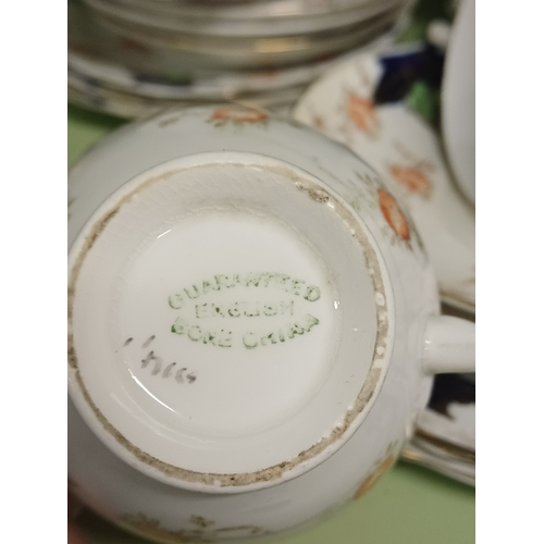 69 - Oriental 17 Piece Pottery Coffee Set and a 21 Piece Bone China Tea Set