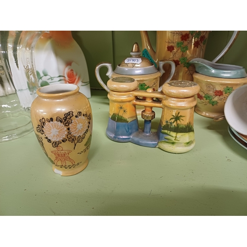 69 - Oriental 17 Piece Pottery Coffee Set and a 21 Piece Bone China Tea Set