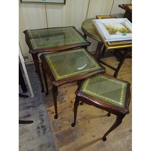 176 - Nest of 3 Mahogany Occasional Tables with Gilt tooled Leather Tops