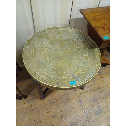 183 - Indian Benares Brass Top Occasional Table with carved Wood Folding base