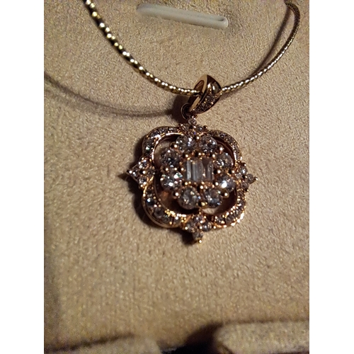 228 - 18 Ct Yellow Gold Natural Diamonds pendant. F colour & VS clarity
47 Diamonds = 0.68 CTs
2 Baguette ... 