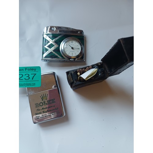 237 - Rolex Lighter, Anker Lighter with clock/fitting together with a vintage match striker