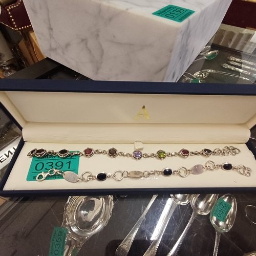 391 - Two decorative Bracelets, one with birthstone gemstones