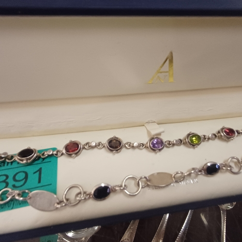 391 - Two decorative Bracelets, one with birthstone gemstones