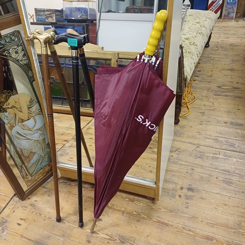 394 - 2 Walking Sticks and a Smithwicks Umbrella