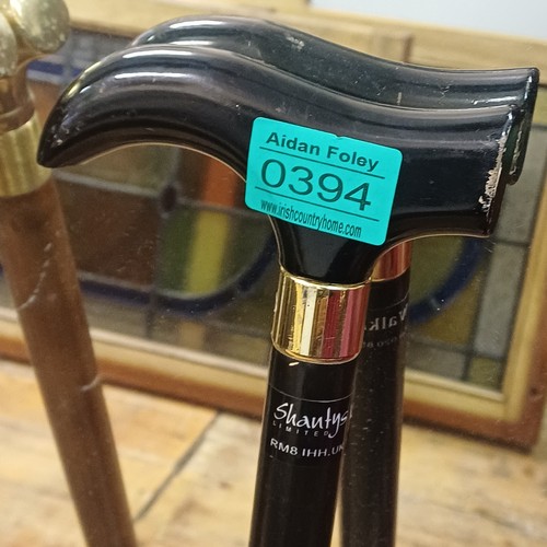394 - 2 Walking Sticks and a Smithwicks Umbrella