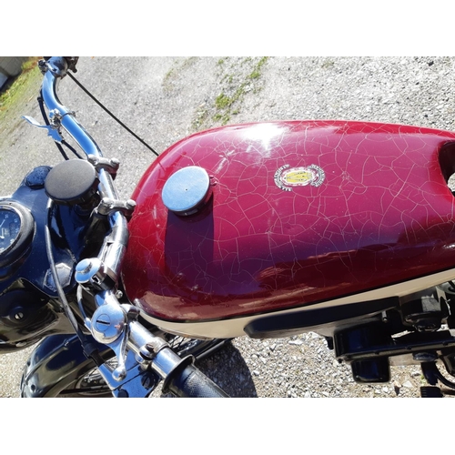 29 - A 1954 BSA M21, registration number 897 UYX, red/black. The large sidevalve BSA was reintroduced to ... 