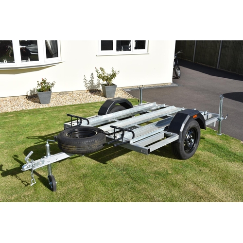 4 - A 2018 single axle triple bike trailer. Constructed by our vendor, this trailer has seen very little... 