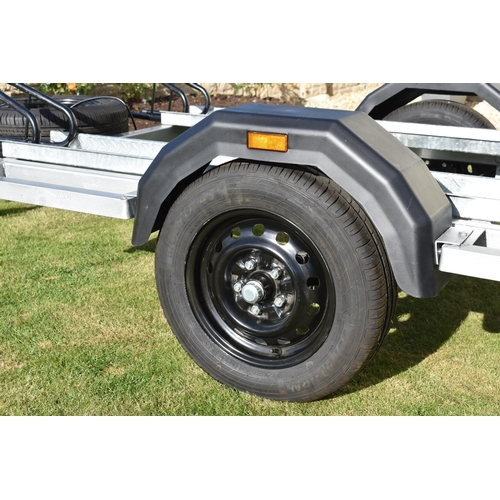 4 - A 2018 single axle triple bike trailer. Constructed by our vendor, this trailer has seen very little... 