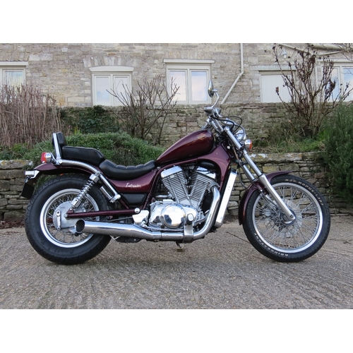 23 - EXTRA LOT:  A 1986 Suzuki VS750 Intruder, registration number D491 FPW, maroon/black.  The cruiser s... 