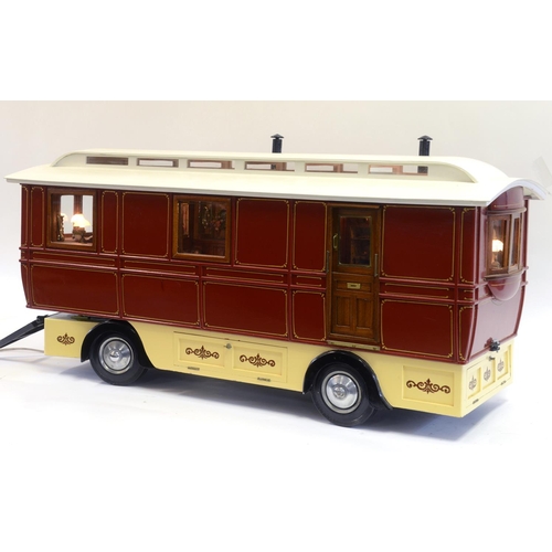 5 - A scratch built showman's travelling caravan, with fitted interior, furnishings and painted detailin... 