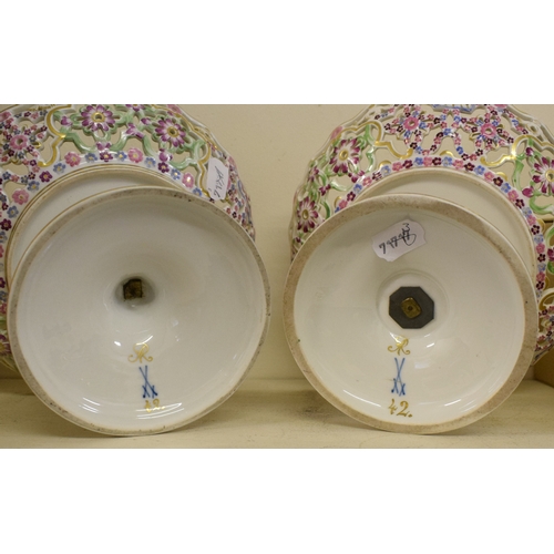 530 - A pair of Meissen porcelain oval comports, with pierced, painted and gilt decoration, No 6, 29.5 cm ... 