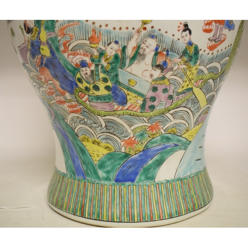 524 - A Chinese porcelain vase and cover, decorated figures, 41 cm high