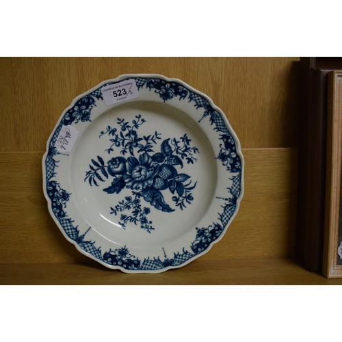 523 - An 18th century Worcester Porcelain bowl, with central floral spray, marked with a crescent in under... 