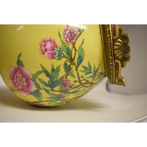 548 - A Chinese vase, decorated prunus on a yellow ground, converted to table lamp, 68 cm high (including ... 