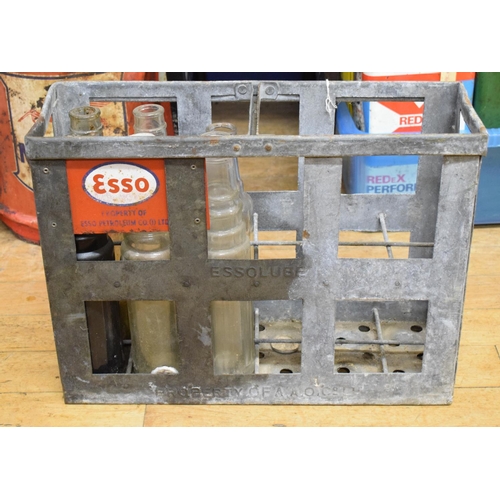 308 - An ESSO twelve division oil bottle carrier, with six half quart bottles (7)