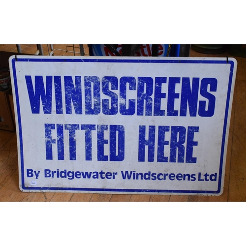 495 - A double sided tin advertising sign, Michelin, a BP petrol pump panel, and a Bridgwater Windscreen s... 