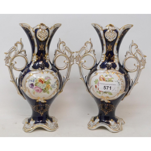 571 - A pair of porcelain vases, decorated flowers, 22 cm high (2)