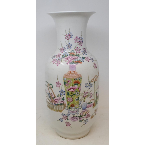 573 - A Chinese famille rose vase, decorated a basket, a vase and flowers, 45 cm high