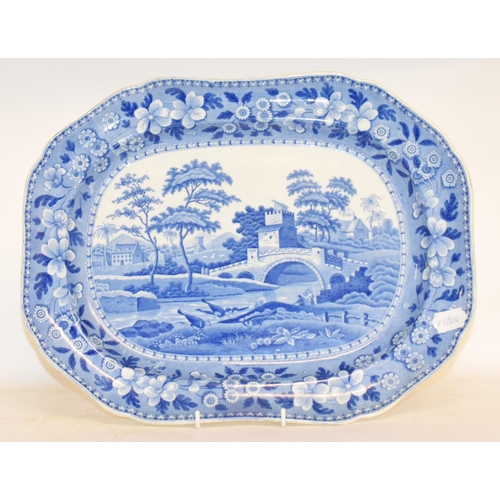 589 - An early 19th century pottery well meat dish, Netley Abbey, Hampshire, 53 cm wide, and two other blu... 