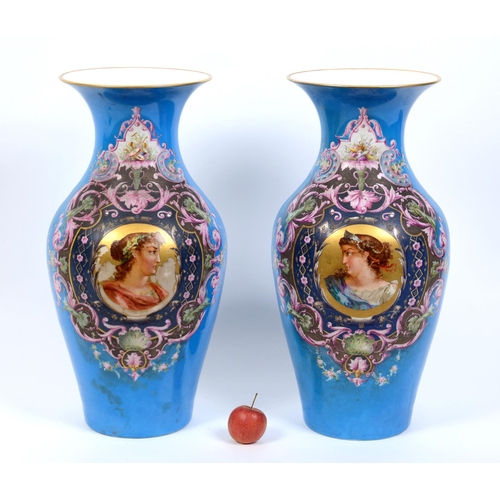 617 - A pair of late 19th century Continental porcelain vases, decorated classical female busts within car... 