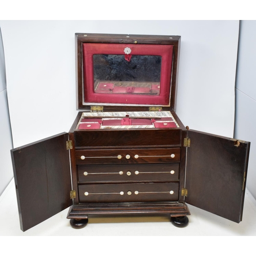 657 - A Victorian inlaid rosewood table top cabinet, 32 cm wide