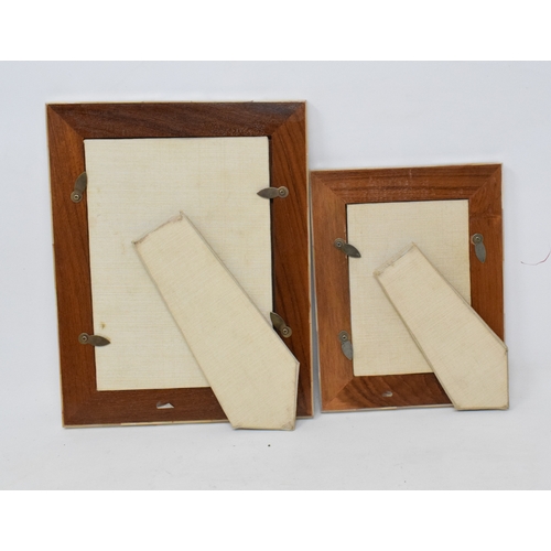 668 - A photograph frame, mounted with mother of pearl, 23 cm high, and another similar, 18 cm high (2)