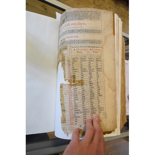 210 - An early 17th century bible, bound with the Book of Psalms and the New Testament, Robert Barker, 161... 