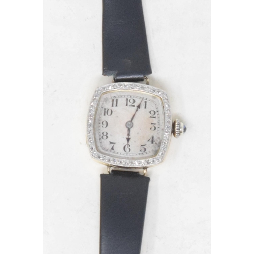 284 - A lady's 18ct gold and diamond cocktail wristwatch, with Arabic numerals