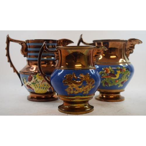 552 - A collection of Victorian copper lustre jugs (box)