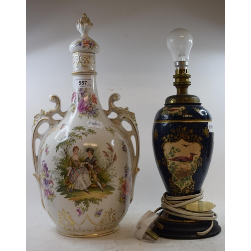 557 - A Limoges two handled vase and cover, decorated a courting scene and flowers, 43 cm high, and three ... 