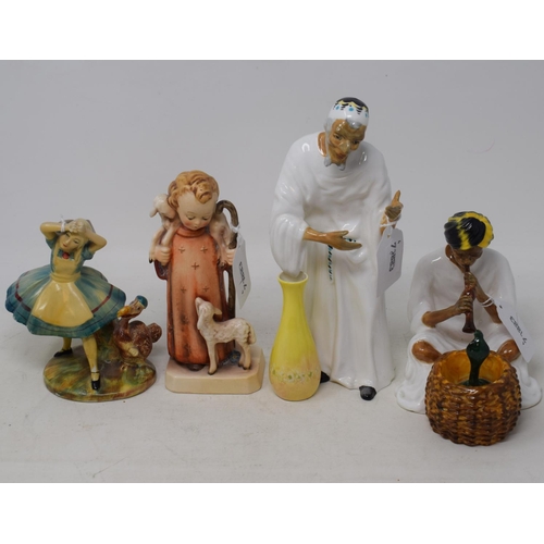 592 - An early Wade group, Alice 1, 12.5 cm high, a Hummel group, the young shepherd, and two Arthur Bowke... 