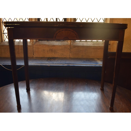 980 - A 19th century inlaid mahogany serpentine front card table, on tapering square legs, 90 cm wide